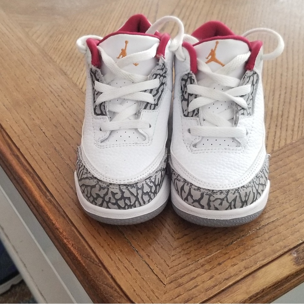 Jordan White and Gray Sneakers with Iconic Design